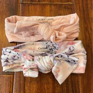 Caden Lane two bows, one pink and one flowered. Worn once! Size 0-3 months.